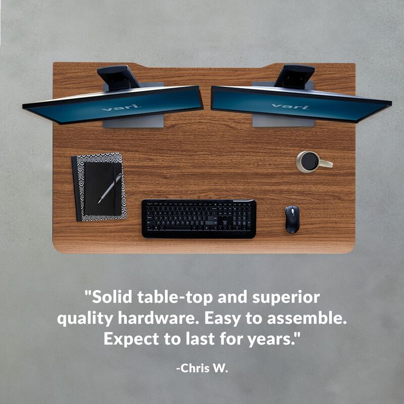 chris states solid table-top and superior quality hardware easy to assemble expect to last for years with a five star review with top view of desk showing  image number null